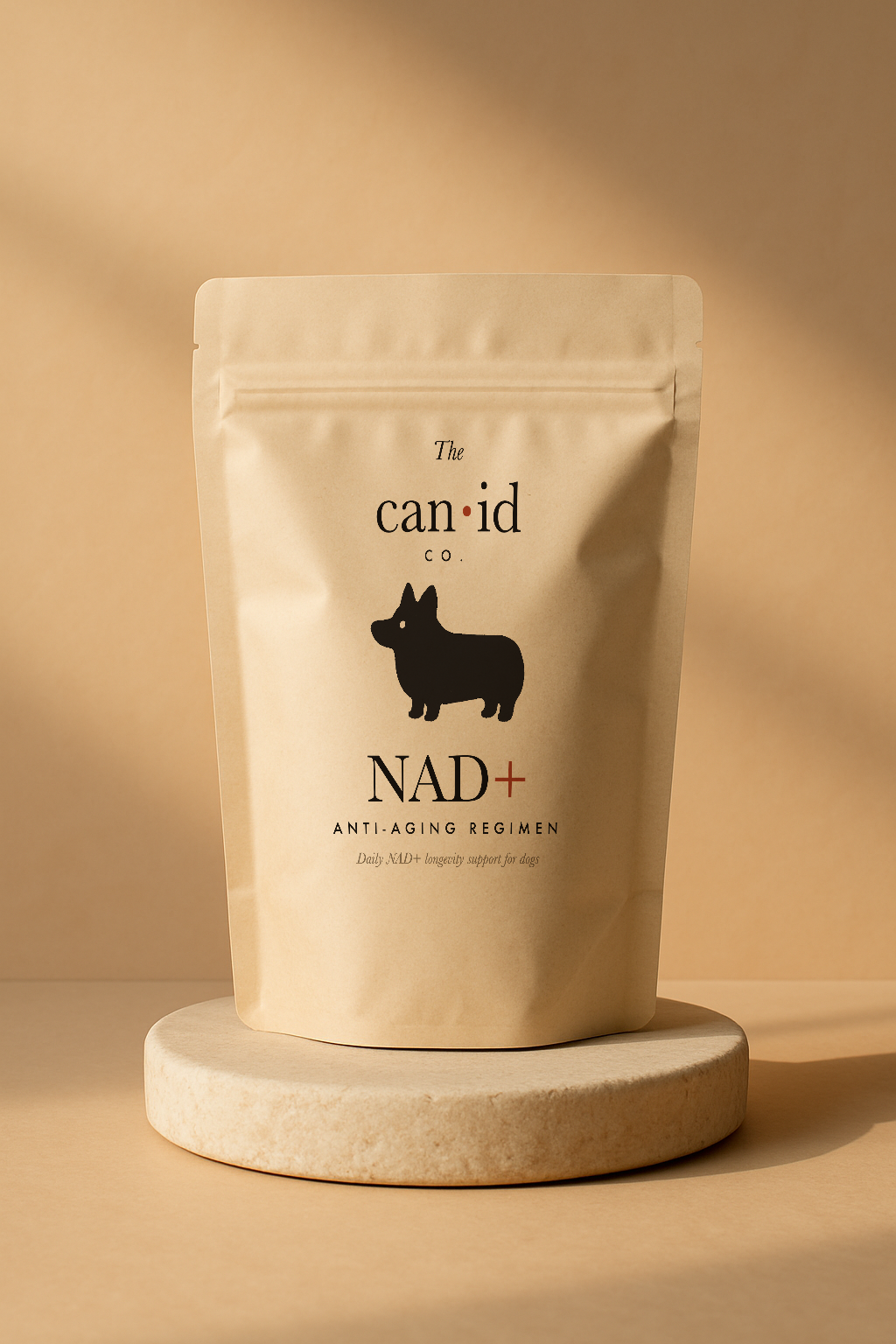 The Can·id Co. NAD+ Anti-Aging Regimen pouch on a stone pedestal